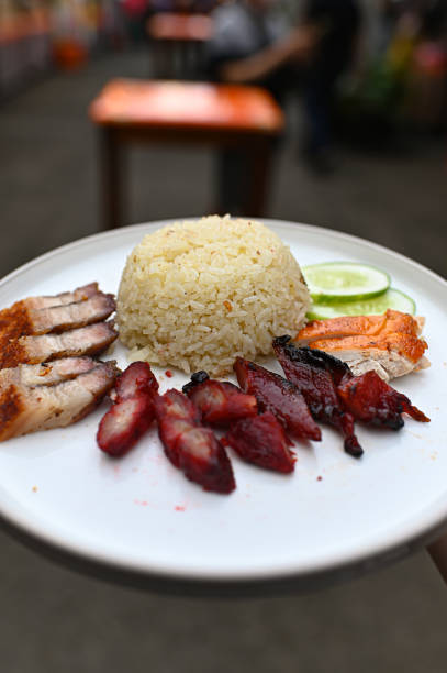 istock Rice on a white plate along with pork and duck 2056743269