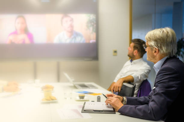 istock Senior businessman attending a hybrid presentation 2056746534