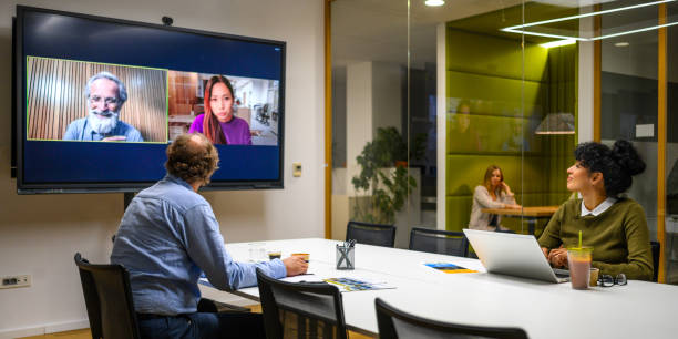 istock Business people attending a hybrid presentation 2056746538