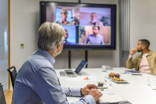 istock Senior businessman attending a hybrid presentation 2056747064