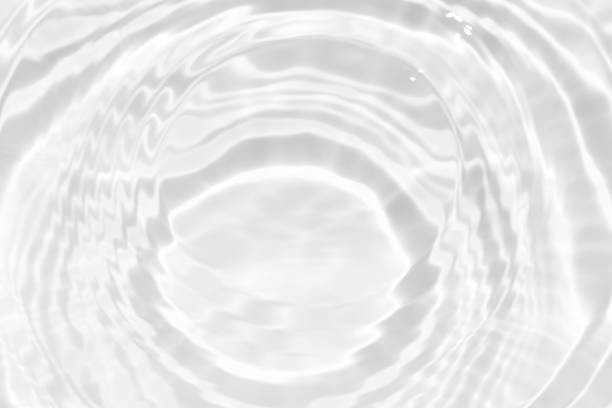 istock White water surface texture with ripples, splashes, and bubbles. Abstract summer banner background Water waves in sunlight with copy space cosmetic moisturizer micellar toner emulsion. White water. 2056863755