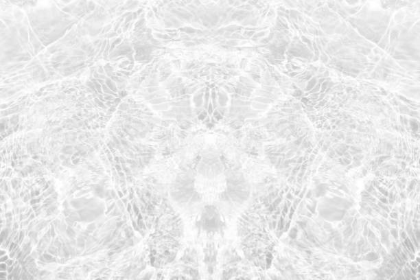 White water surface texture with ripples, splashes, and bubbles. Abstract summer banner background Water waves in sunlight with copy space cosmetic moisturizer micellar toner emulsion. White water.