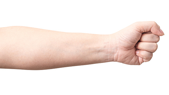Close up male showing fist hand isolated on a white background  with clipping path