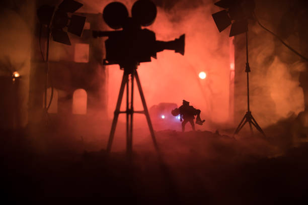 istock Action (War) movie concept. Man moving out with little boy from burned out city destroyed in war. Military fighting silhouettes. 2056893473