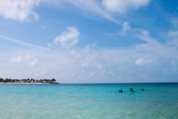 istock Kids snorkeling at the beautiful beach 2056942909