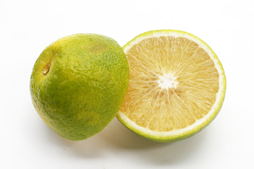 Citrus sinensis, sweet orange fruit on white background