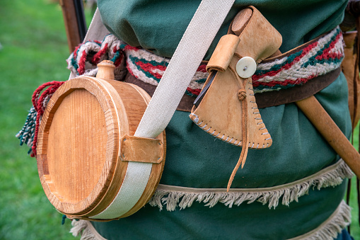 Frontier soldier of the American Revolution carrying items he needs to survive in the period of that time.