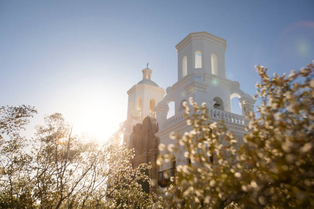 Built in 1797, afternoon light shines on the historic Spanish colonial era San Xavier del Bac Mission in Tucson, Arizona, USA.