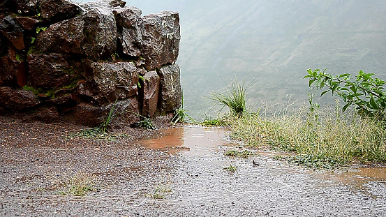The Rainwater Falling to The Puddles in The mountain of Pisaq in Cusco