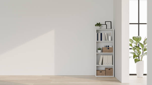 istock A modern, minimal office corridor features a shelf, a houseplant, a parquet floor, and a white wall. 2057011079