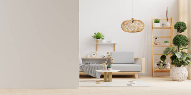 istock Interior living room wall mockup with sofa and decor on white background 2057042961