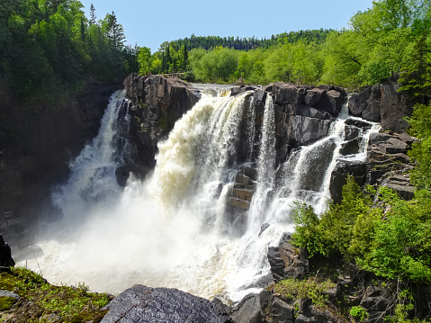 High Falls, Pigeon River, Grand Portage, Minnesota, waterfalls in summer with fast rushing water on a clear day
