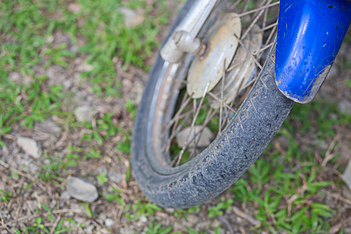 Motorcycle tires wear out and wear out. road safety except copy space