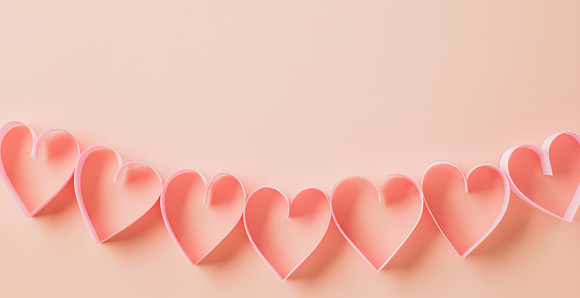 Happy Valentines Day. Flat lay pink ribbon heart shaped on pastel pink background, Festive background with copy space, Valentine's day concept