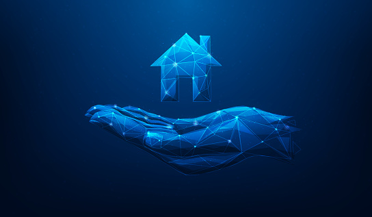 businessman hand holding house icon digital technology on blue background. home Loan concept. real estate mortgage and finance bank. vector illustration fantastic low poly wireframe design.