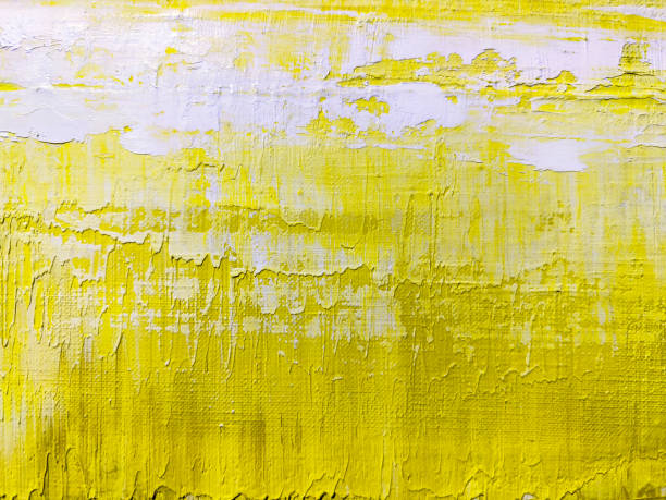 istock bright hand painted artistic canvas background in yellow colors. 2057210482