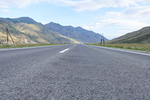 Road in mountainous terrain. New road, Mountain Altai. Low angle.