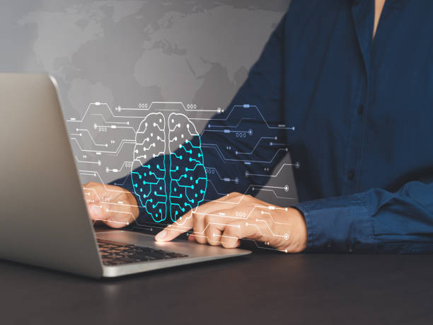 istock A young woman is using AI technology for working tools. Chat with AI and Artificial intelligence command prompt to generate support work. 2057242711