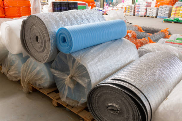 istock Different Insulation material in rolls for sale on a store warehouse. 2057242759