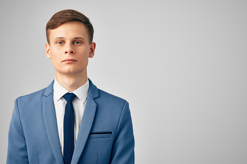 man with a jacket in a tie executive Professional isolated background. High quality photo