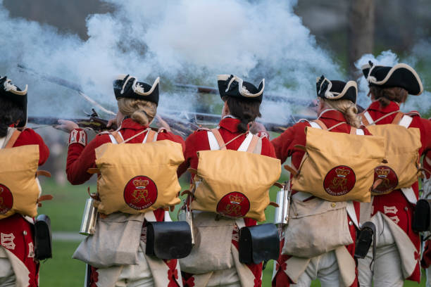 Drummer in traditional Scottish attire performing at the Halifax Citadel in Nova Scotia, with stone architecture in the background, photographed in summer 2025.