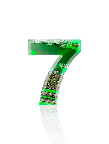 Close-up of three-dimensional circuit board number 7 on white background.