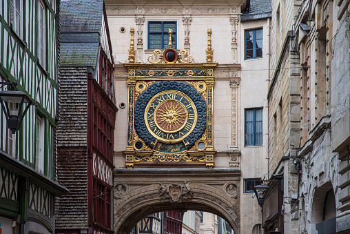 Close-up of a very old clock in the city centre of Rouen in France