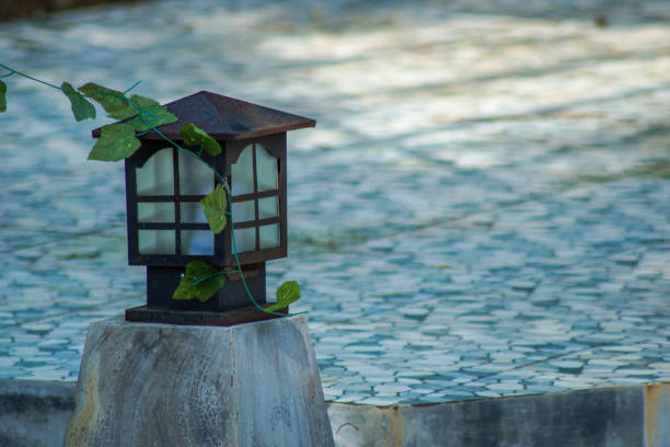 istock wooden lantern in the garden 2057303627