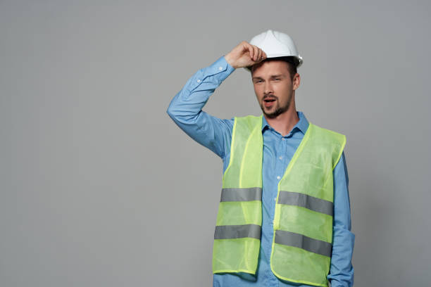 istock male builders protection Working profession isolated background 2057317144