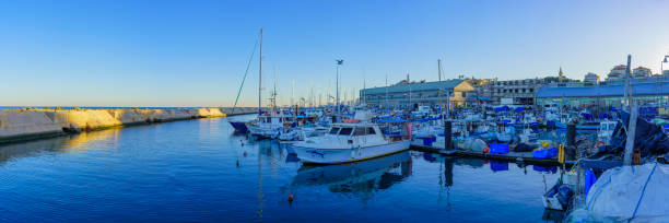 Tel-Aviv, Israel - February 29, 2024: Panoramic view of the Jaffa port, with various fishing boats. Now part of Tel-Aviv-Yafo, Israel