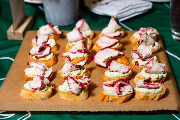 istock Crostini Appetizers with Turkey breast slices, edges color with Beetroot juice 2057407474