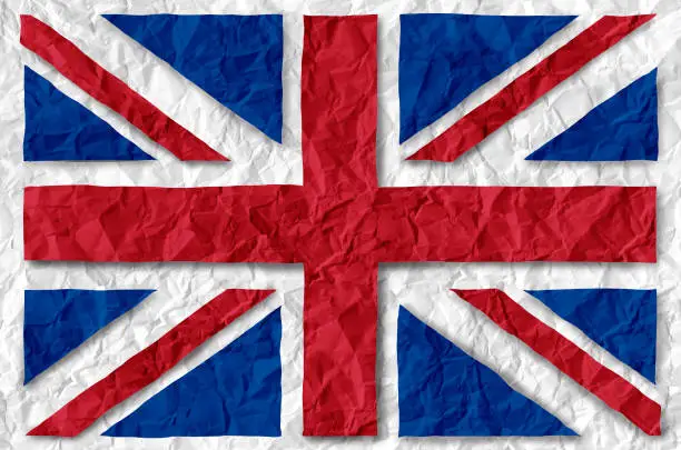 Great Britain Paper Flag as an old vintage British symbol of patriotism and English culture on an antique textured United Kingdom government and political icon created to support England Scotland and Whales.