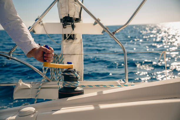 istock Hand winding rope with cable winch on sailboat 2057472182