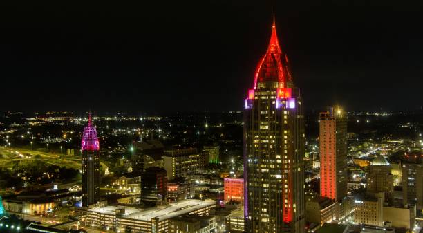 istock Downtown Mobile, AL riverside at night 2057476394