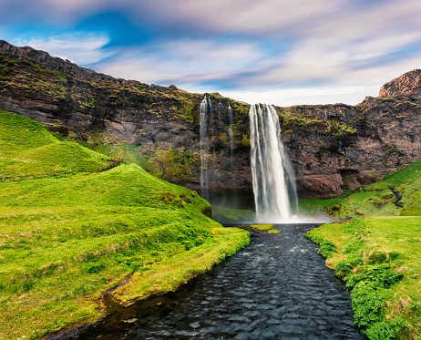Great morning view of Seljalandfoss Waterfall on Seljalandsa river. Colorful summer scene on south coast of Iceland, Europe. Artistic style post processed photo.