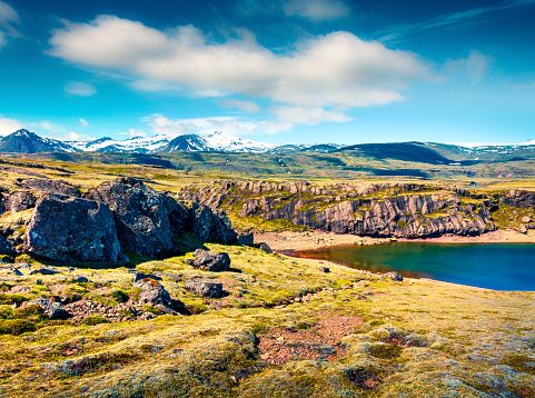 Typical Icelendic landscape with volcanic cround and pure water lake. Colorful sunny scene in the south Iceland, Europe. Artistic style post processed photo.