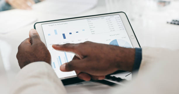 istock Business hands, screen and tablet for data analytics, graphs and chart or marketing profit, increase and planning in meeting. Professional people and clients with infographics on digital technology 2057508112