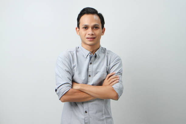istock happy confident asian indonesian man on isolated background 2057543622