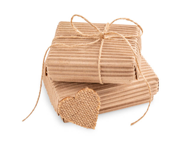 istock Craft zero waste recycled carton gift box with string bow and heart shape decor isolated on white 2057544211