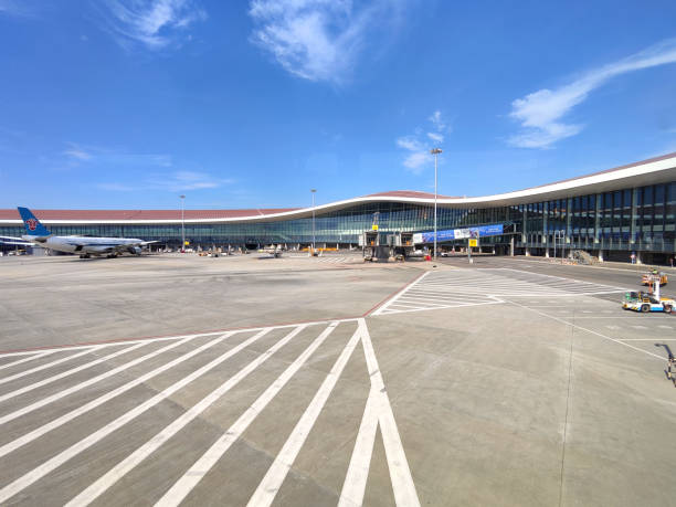 Aircraft at Beijing Daxing International Airport , is one of two international airports serving Beijing, the capital city of China. It has the world's largest single-building airport terminal.
