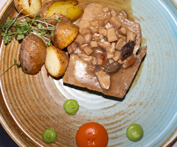 istock beef steak with mushroom sauce and new potato 2057624404