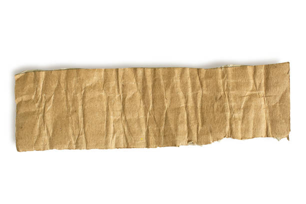 istock Torn piece of kraft paper isolated. 2057668054