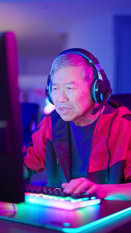 asian elderly online gamer eyeache