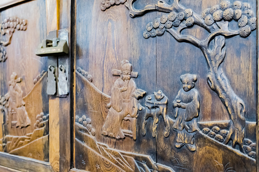 Wooden cabinets with wood carvings
