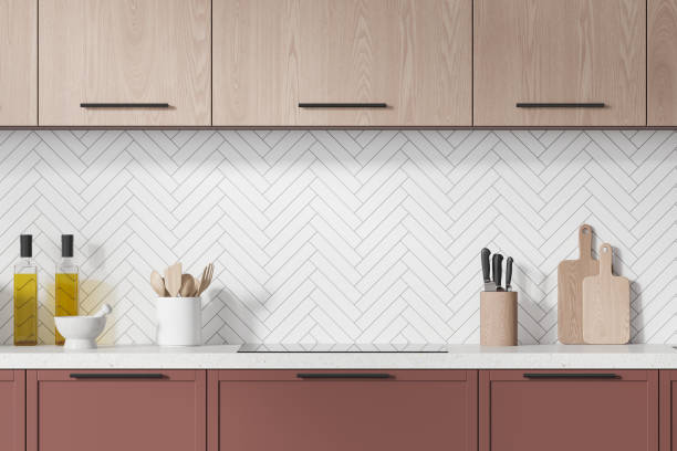 istock Modern home kitchen interior with cabinet, stove and kitchenware on counter 2057683802