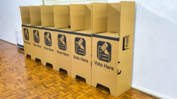istock Cast your vote in confidence, secure election booths lined up 2057683805