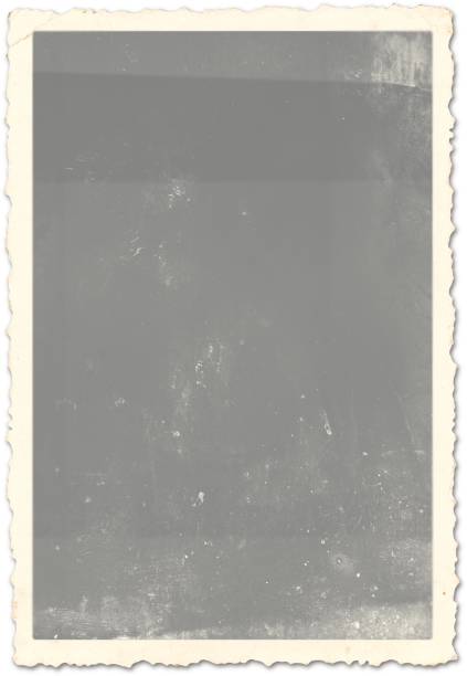 istock Close up view vintage photo paper isolated on plain background. 2057697502