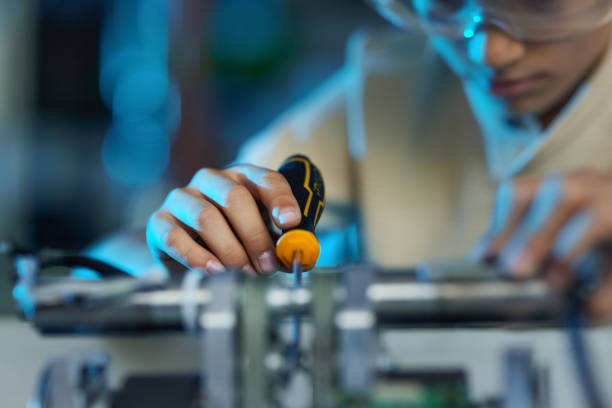 istock Close up of a schoolboy working on a project in laboratory. 2057746942