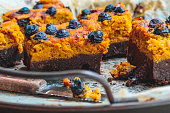 Delicious chocolate cake with batata cream and blueberry