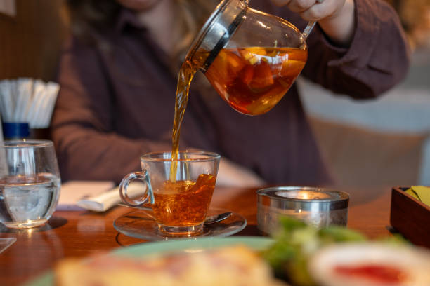 istock Pouring a Cup of Herbal Tea 2057776287